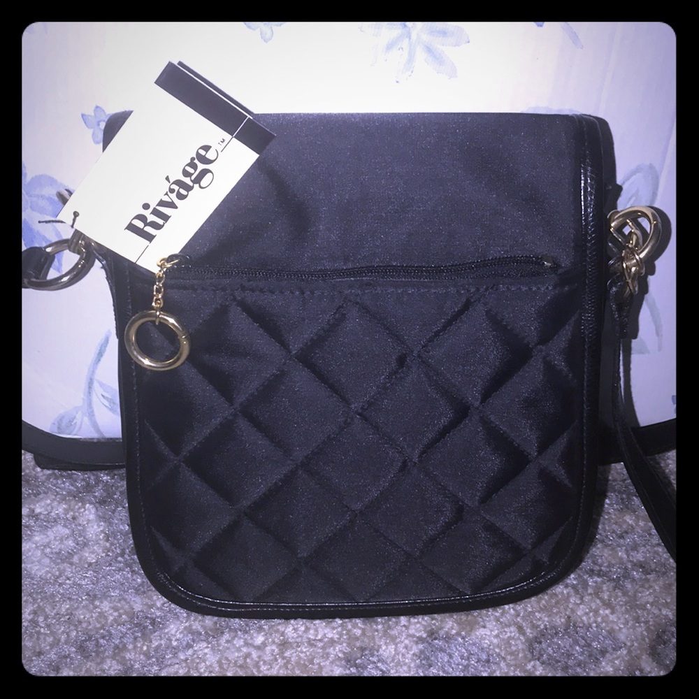 Cross-body bag with gold detailing.